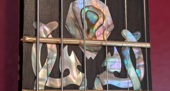 Curvy, quilted, custom guitar.